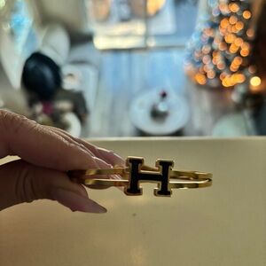 Hermes Gold and Black Bracelet